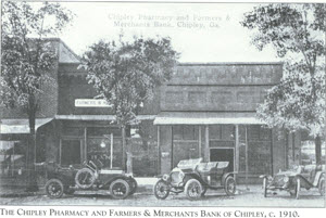 Chipley Pharmacy and Farmers
                & Merchants Bank of Chipley, 1910